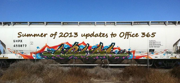 En hvid godsvogn med graffiti og teksten “Summer of 2013 updates to Office 365”.